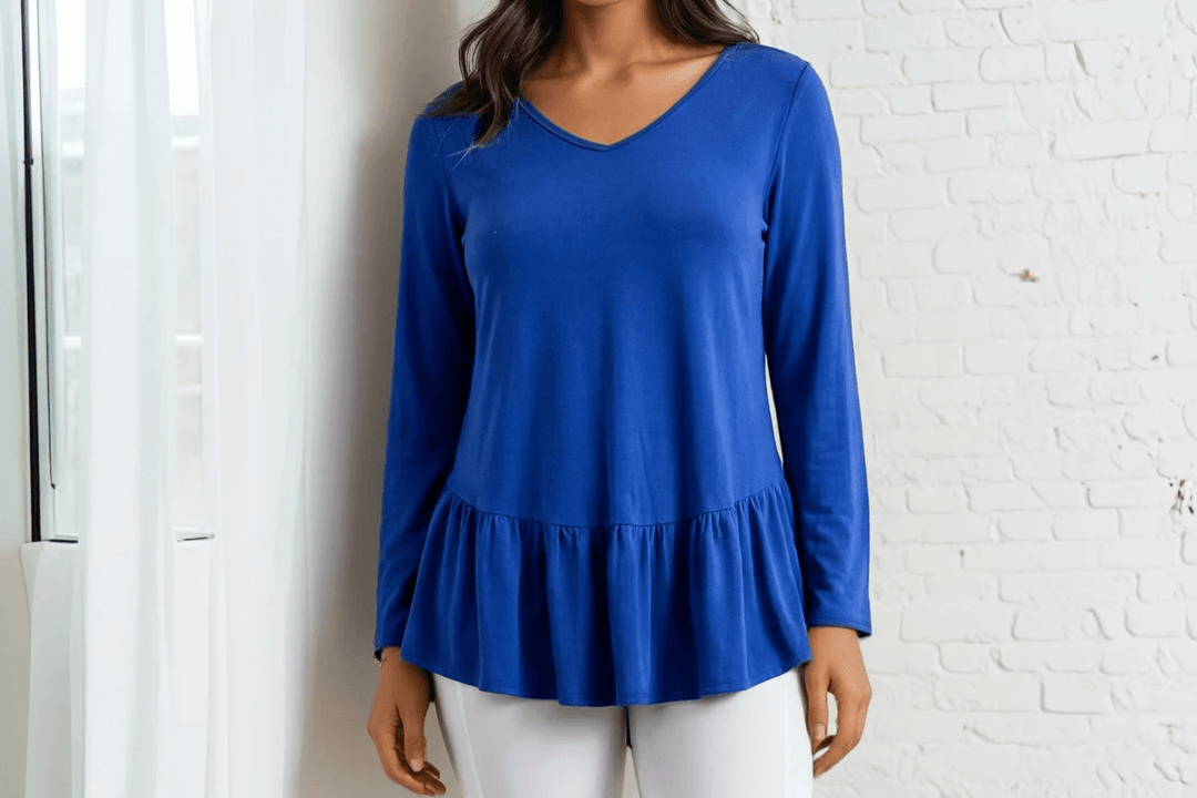 Shop women's tunic tops made in the USA. Flattering, versatile American-made tunics perfect with leggings or as a mini dress.