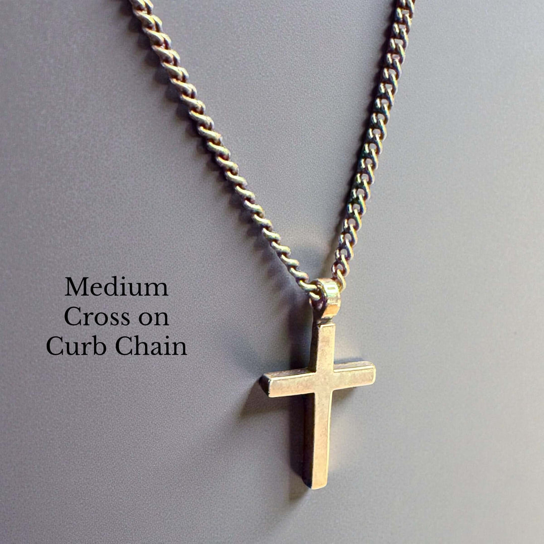 Handcrafted solid bronze cross necklace on an antique bronze chain. Custom lengths available. Made in USA with a lifetime warranty.