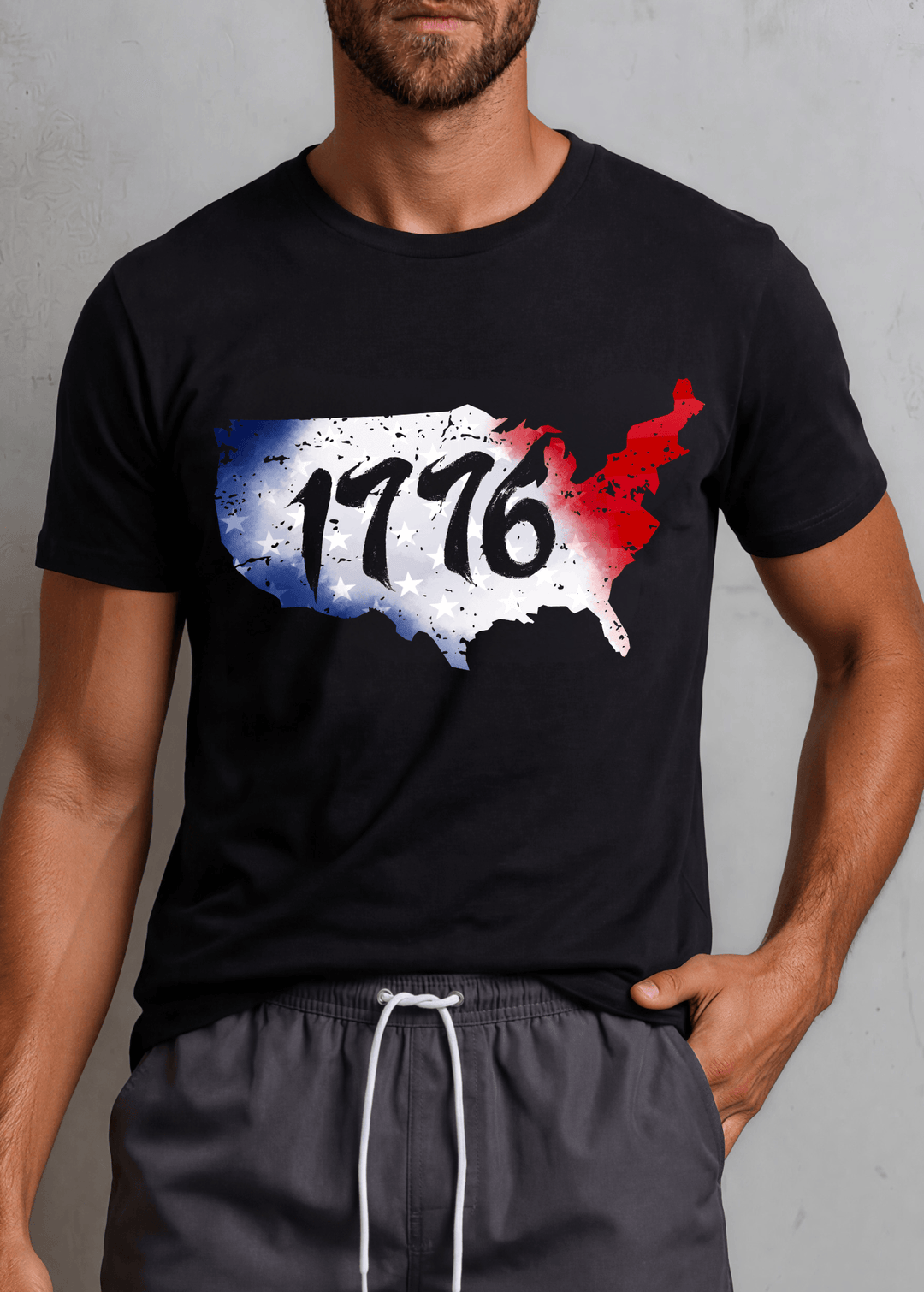 Men's 1776 USA map graphic tee in Black. Distressed red, white & blue print. Made in USA, 100% ring-spun cotton, relaxed unisex fit. Perfect for 4th of July.