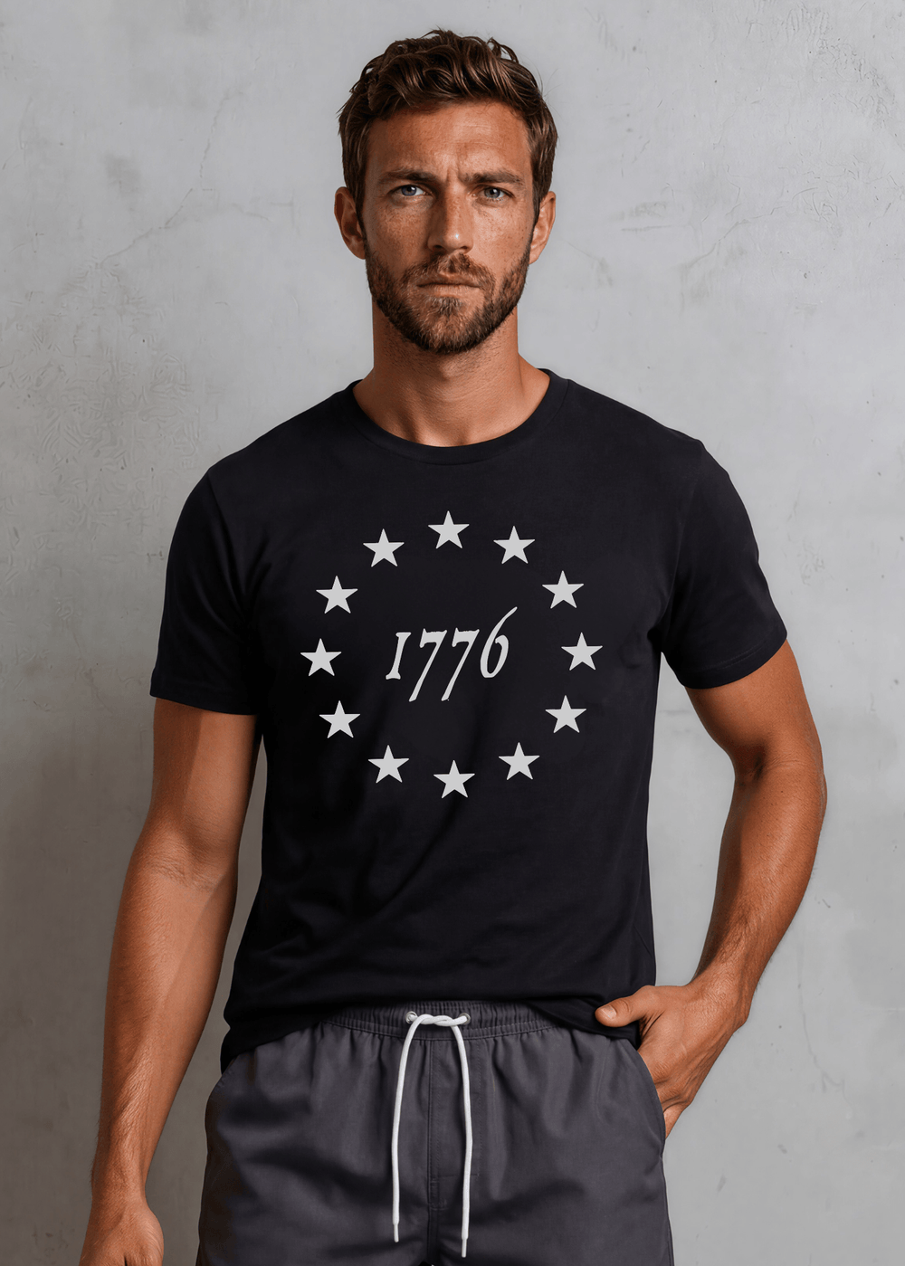 Men's 1776 Betsy Ross 13-star circle graphic tee in Navy or Black. Made in USA, 100% ring-spun cotton, relaxed unisex fit. Perfect patriotic tee.