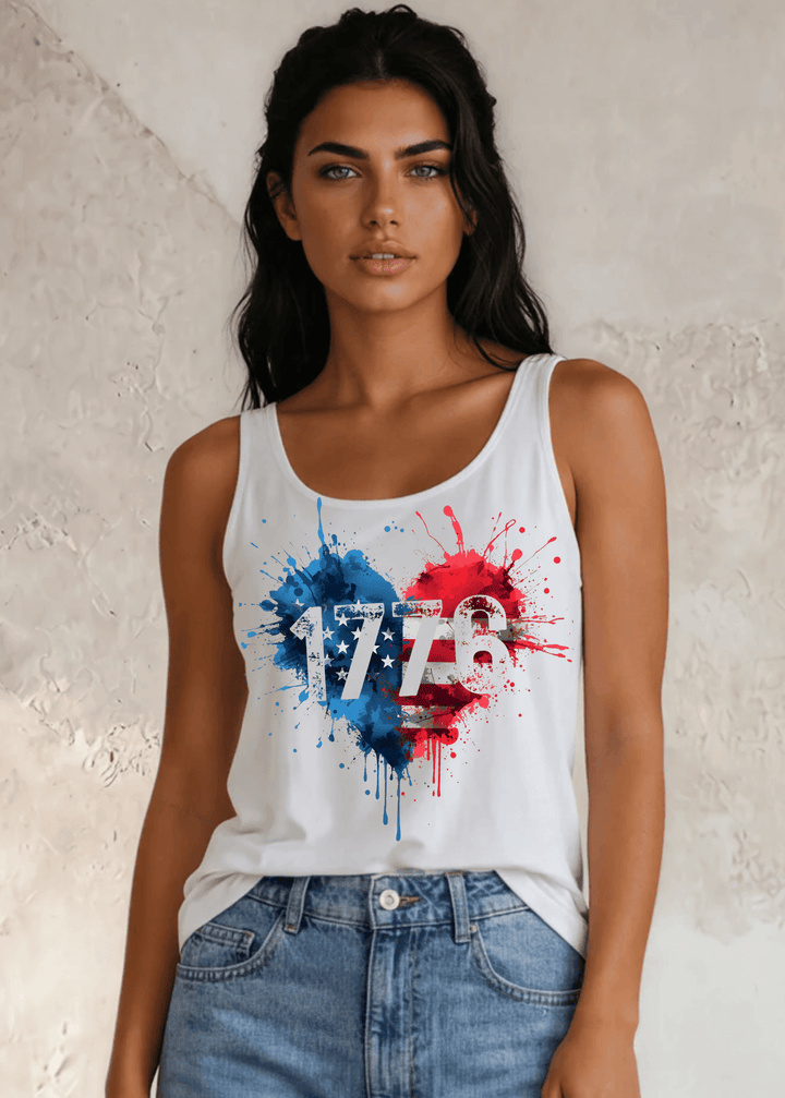 Celebrate your American pride in this 1776 Paint Splatter Heart Graphic Tank Top Made in USA with USA Grown Cotton. Soft, breathable 95% cotton 5% spandex. 