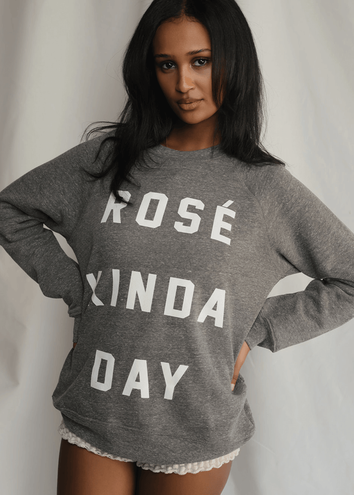 Warning: May induce day-drinking fantasies. This heather grey sweatshirt isn&