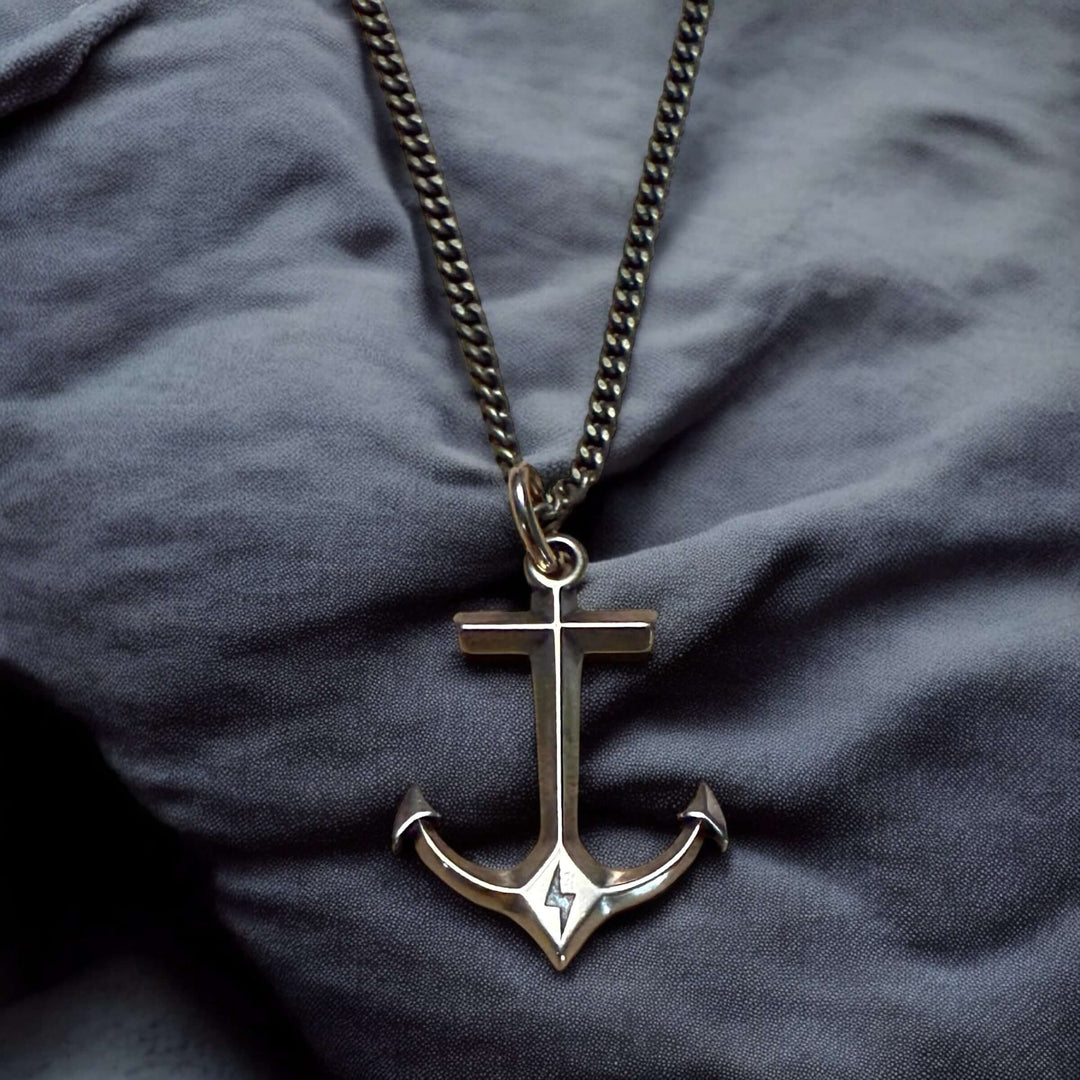 Handcrafted solid bronze anchor necklace on an antique bronze chain. Unisex. Custom lengths available. Made in USA with a lifetime warranty.