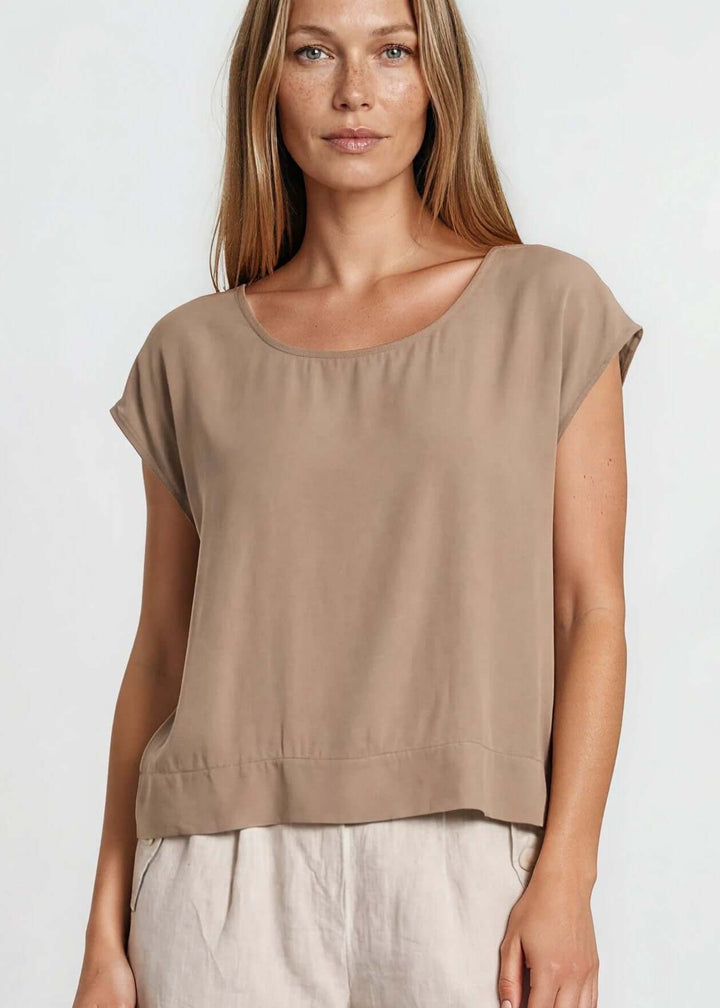 Shop the Bella Boxy Top in Dune — a lightweight 100% rayon crosshatch woven top with a relaxed fit and cap sleeves. Made in USA. True to size.