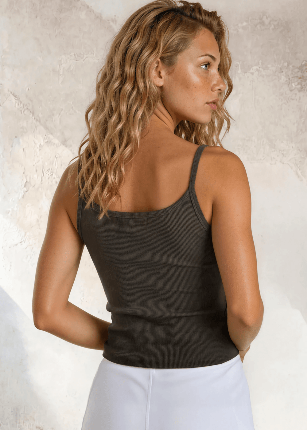 The Strappy by Bra30 — The "After Bra" You'll Live In Meet your new everyday essential. The Strappy is a short ribbed crop top with thin straps, designed to layer effortlessly under your favorite tee or wear solo on its own. Made with 90% Cotton and 10% Spandex, Army Green Color, Made in USA