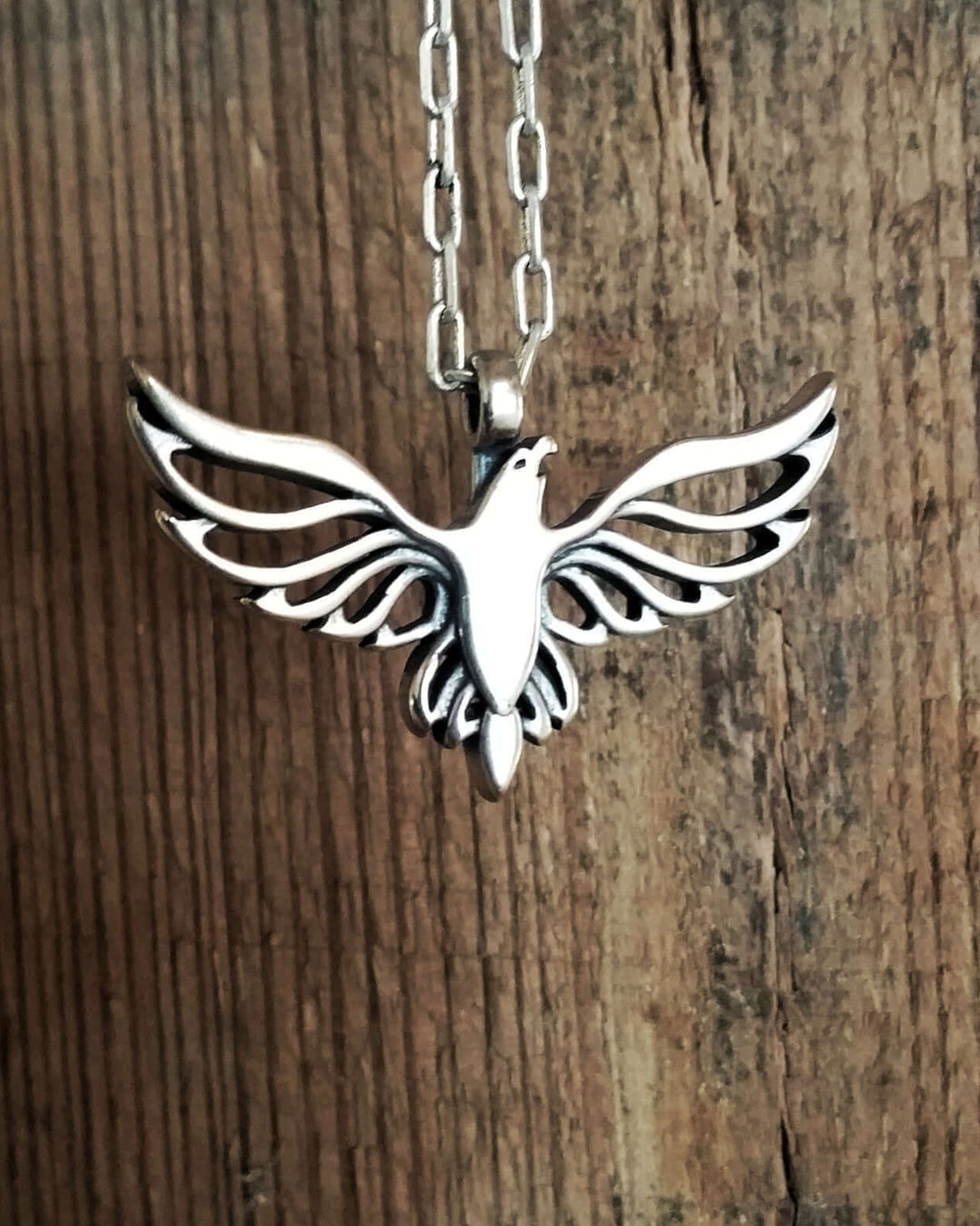 Handcrafted solid sterling silver eagle necklace on an 18 or 24 inch chain. Made in USA with a lifetime warranty