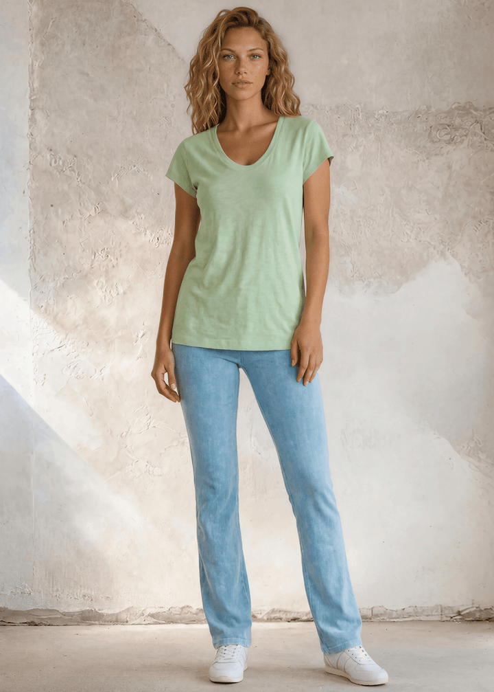 Shop the Meghan Tee — a garment-dyed, fitted scoop neck tee in Neil Green. 50% cotton / 50% modal, ultra-soft, lightweight, and proudly Made in USA.