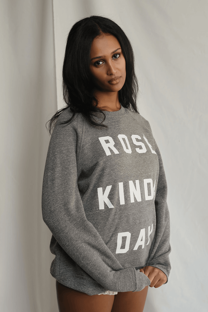 Warning: May induce day-drinking fantasies. This heather grey sweatshirt isn&