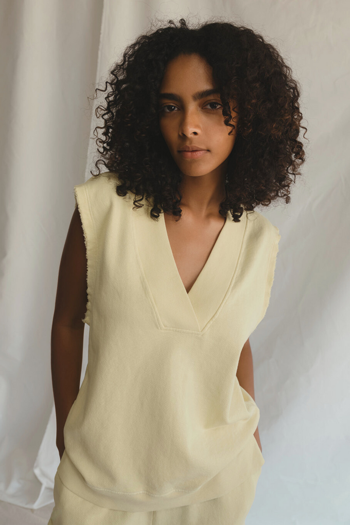 Shop the Villa Vest by People of Leisure — raw edge, ribbed V-neck in hemp &amp; organic cotton. Limoncello &amp; Sand. Sizes XS–XL.