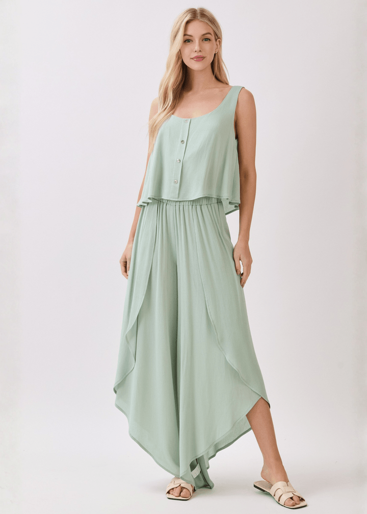 Breezy sage green flowy pants with elastic waist &amp; overlap split leg detail. Lightweight 100% rayon. Made in USA. Perfect for vacation &amp; resort wear.