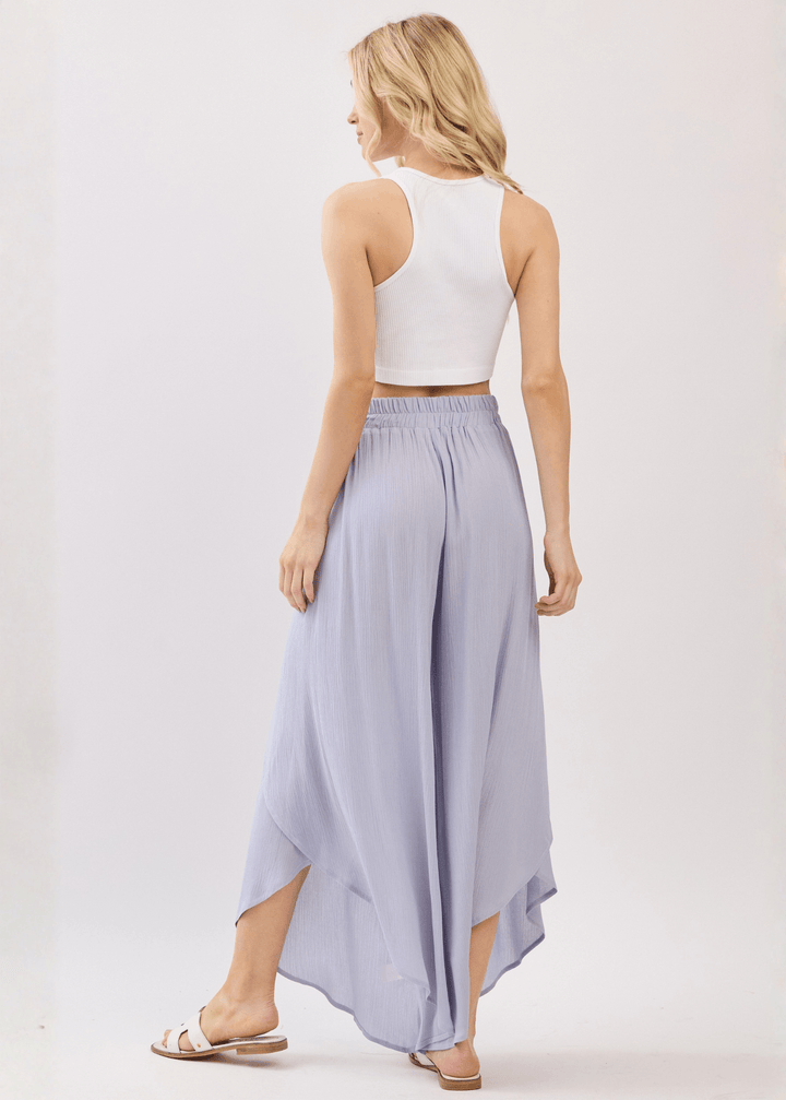 Breezy Pale Periwinkle flowy pants with elastic waist &amp; overlap split leg detail. Lightweight 100% rayon. Made in USA. Perfect for vacation &amp; resort wear.
