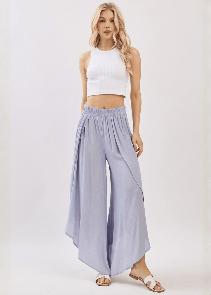 Breezy Pale Periwinkle flowy pants with elastic waist &amp; overlap split leg detail. Lightweight 100% rayon. Made in USA. Perfect for vacation &amp; resort wear.