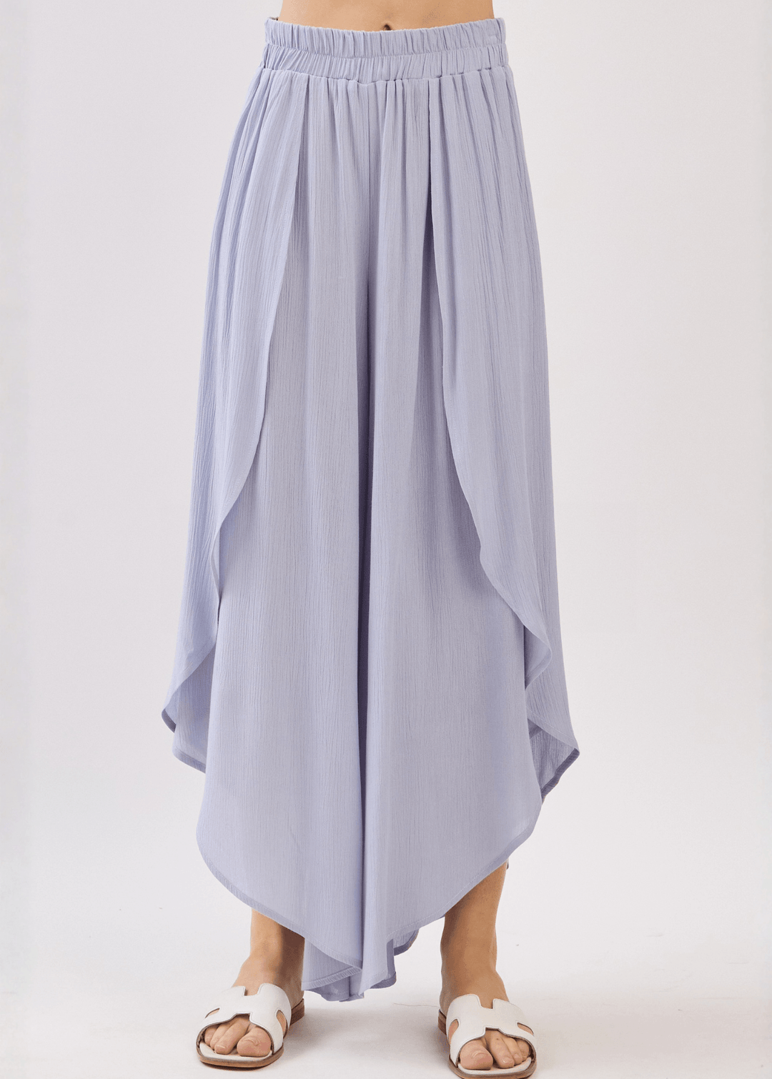 Breezy Pale Periwinkle flowy pants with elastic waist & overlap split leg detail. Lightweight 100% rayon. Made in USA. Perfect for vacation & resort wear.
