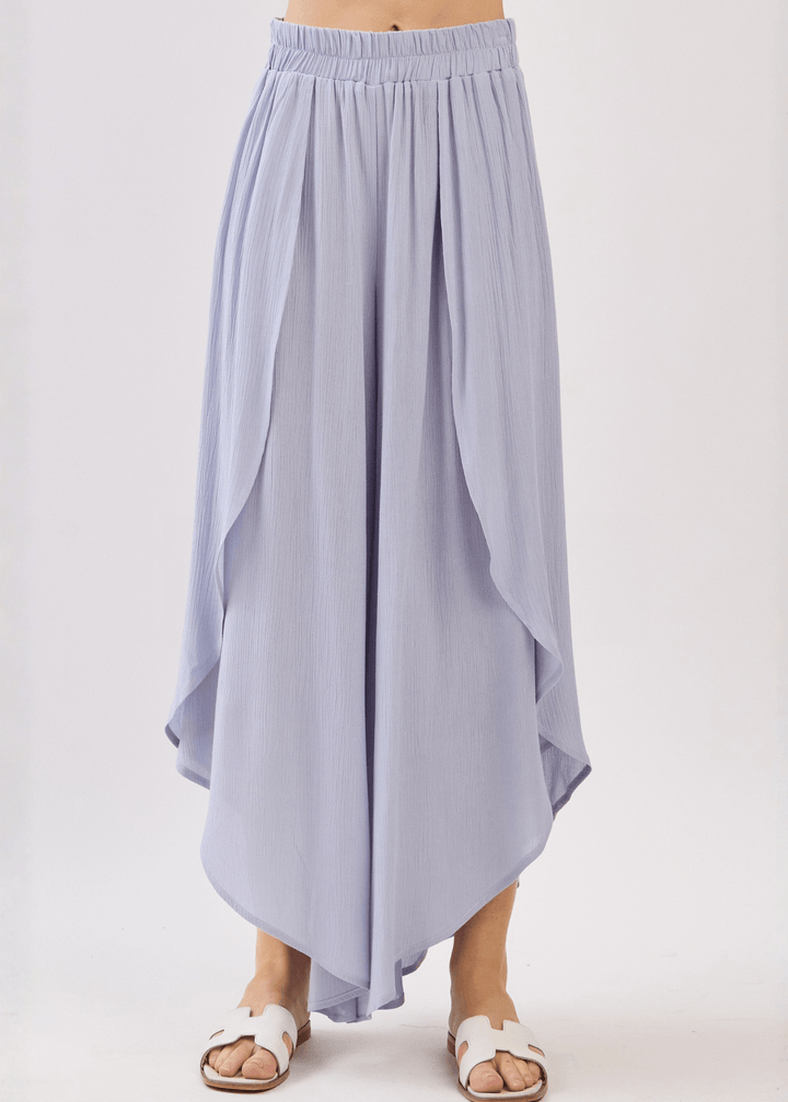Breezy Pale Periwinkle flowy pants with elastic waist &amp; overlap split leg detail. Lightweight 100% rayon. Made in USA. Perfect for vacation &amp; resort wear.