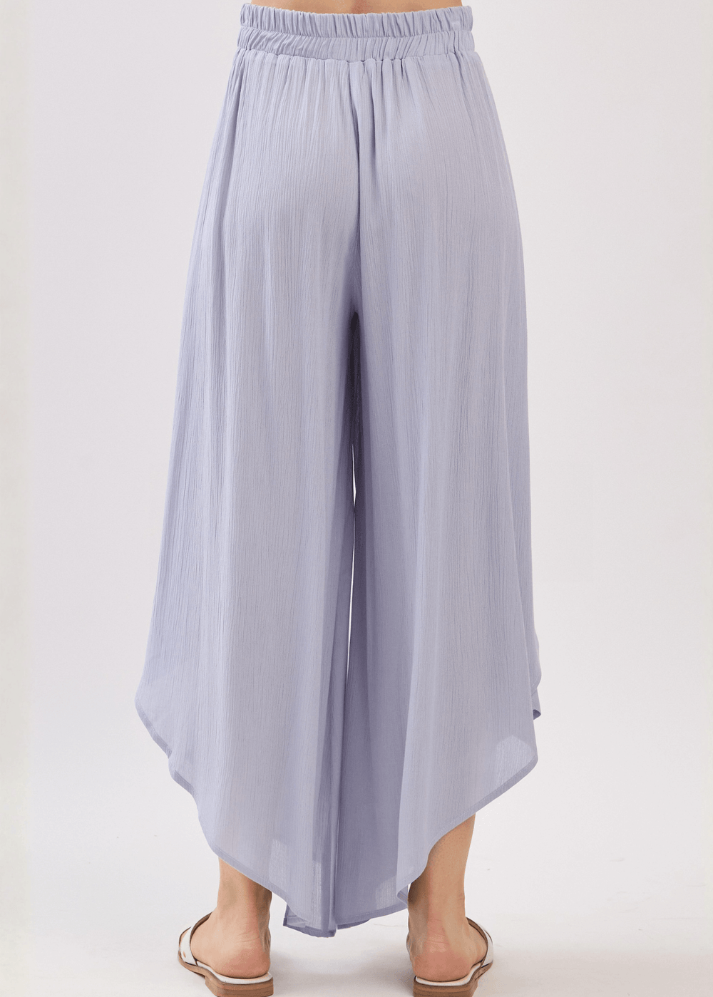 Breezy Pale Periwinkle flowy pants with elastic waist & overlap split leg detail. Lightweight 100% rayon. Made in USA. Perfect for vacation & resort wear.