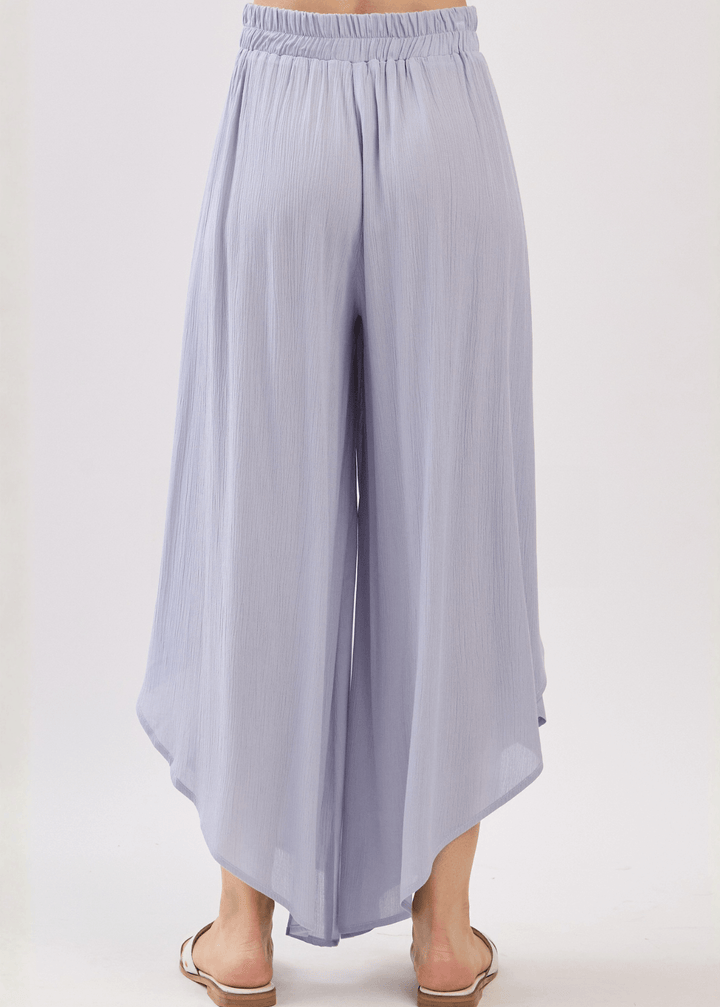Breezy Pale Periwinkle flowy pants with elastic waist &amp; overlap split leg detail. Lightweight 100% rayon. Made in USA. Perfect for vacation &amp; resort wear.