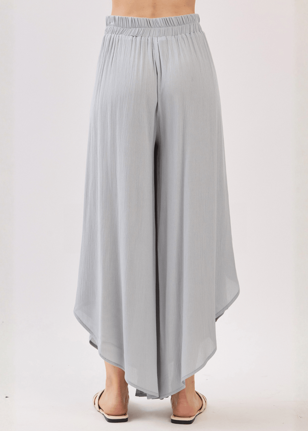 Breezy Gracious Gray flowy pants with elastic waist & overlap split leg detail. Lightweight 100% rayon. Made in USA. Perfect for vacation & resort wear.