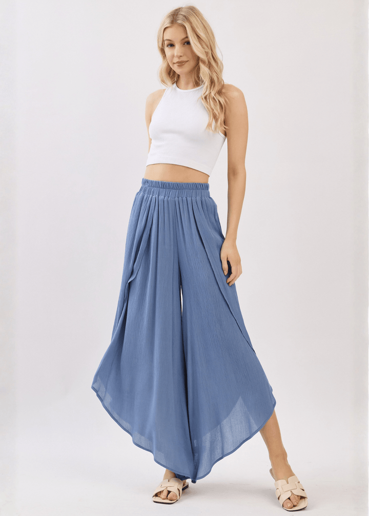 Breezy Denim Blue flowy pants with elastic waist &amp; overlap split leg detail. Lightweight 100% rayon. Made in USA. Perfect for vacation &amp; resort wear.