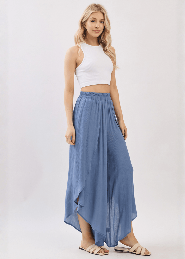 Breezy Denim Blue flowy pants with elastic waist &amp; overlap split leg detail. Lightweight 100% rayon. Made in USA. Perfect for vacation &amp; resort wear.