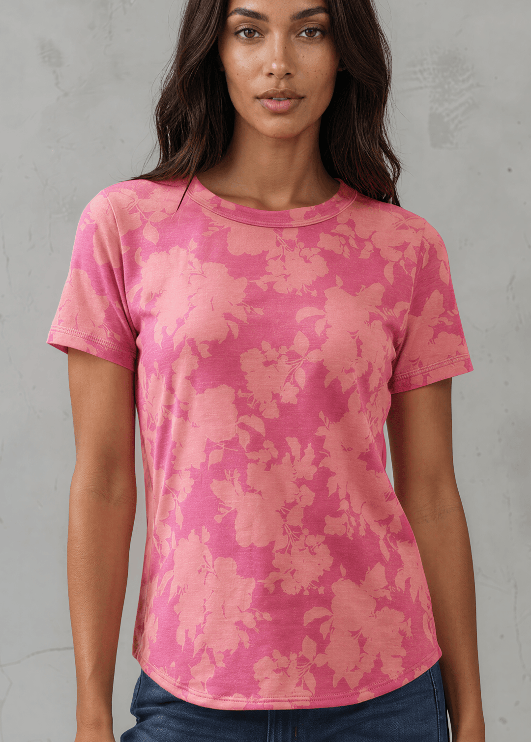 Fuchsia Floral Fashion Tee. Tonal watercolor hibiscus print, soft stretch knit, crew neck, regular fit. Bold & feminine. Made in USA. Sizes S–XL.