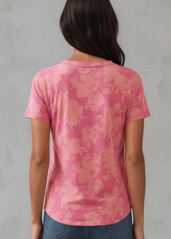 Fuchsia Floral Fashion Tee. Tonal watercolor hibiscus print, soft stretch knit, crew neck, regular fit. Bold &amp; feminine. Made in USA. Sizes S–XL.