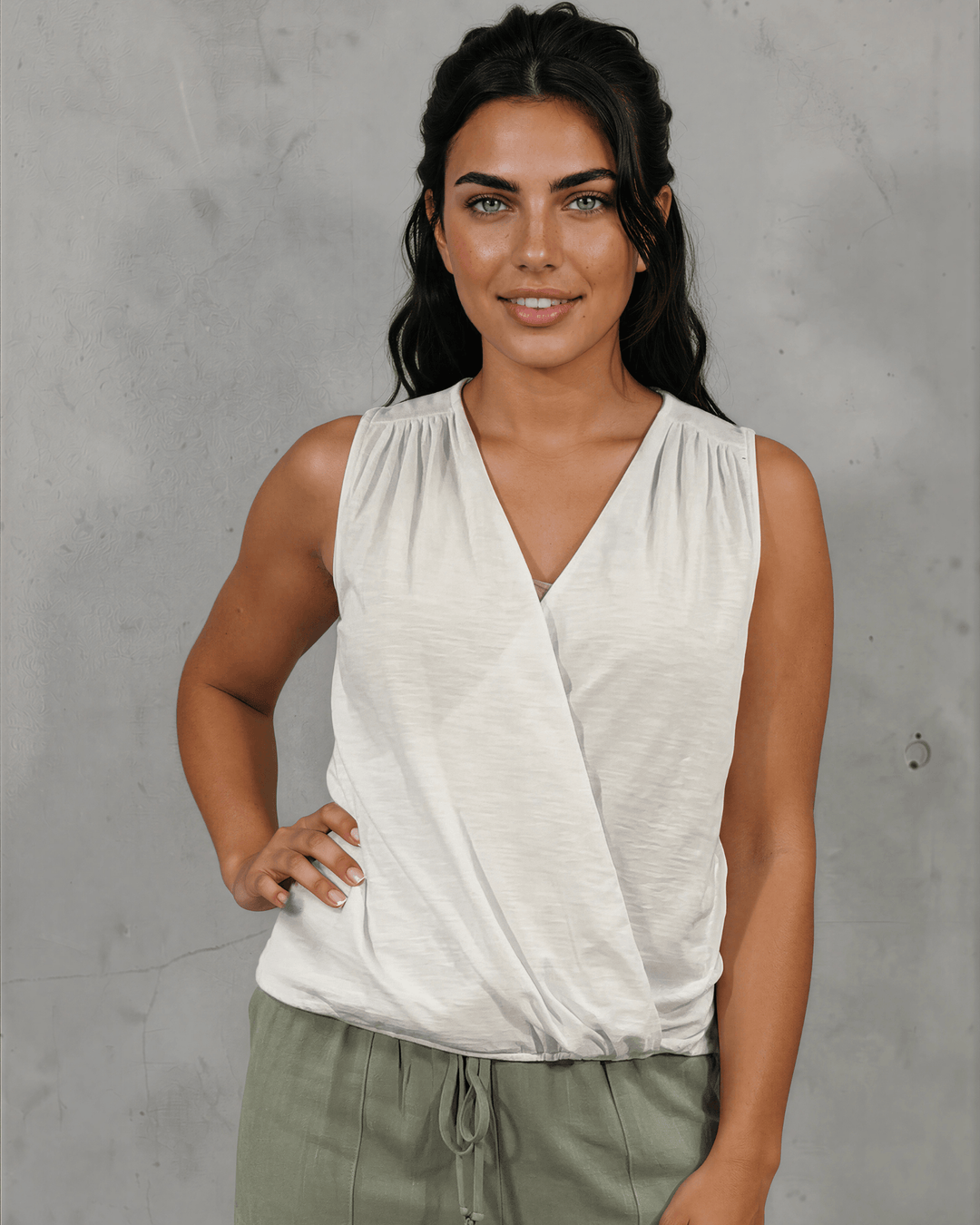 Shop the Courtney Cotton Surplice V Neck Top in White. Relaxed blousy fit, feminine V-neckline, soft 95% cotton. Proudly made in the USA. Sizes S–L.  Renee C Style 3463TP