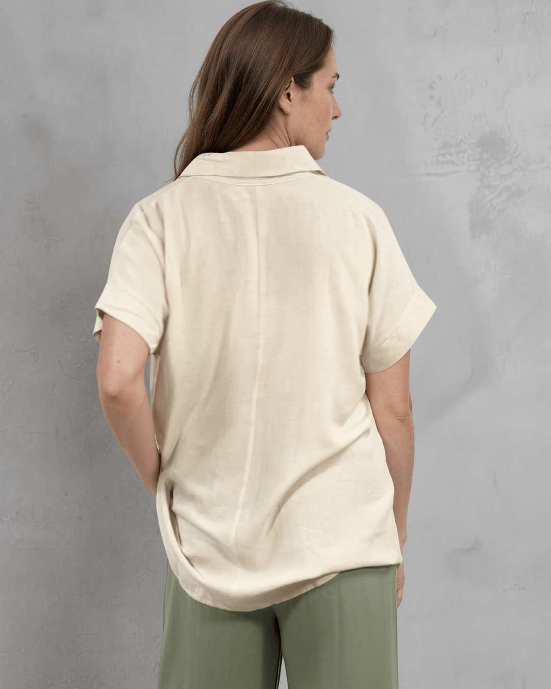 Effortlessly chic linen blend collared top in Natural. Relaxed oversized fit, V-neck, short sleeves. Made in USA. Perfect for summer &amp; resort wear.