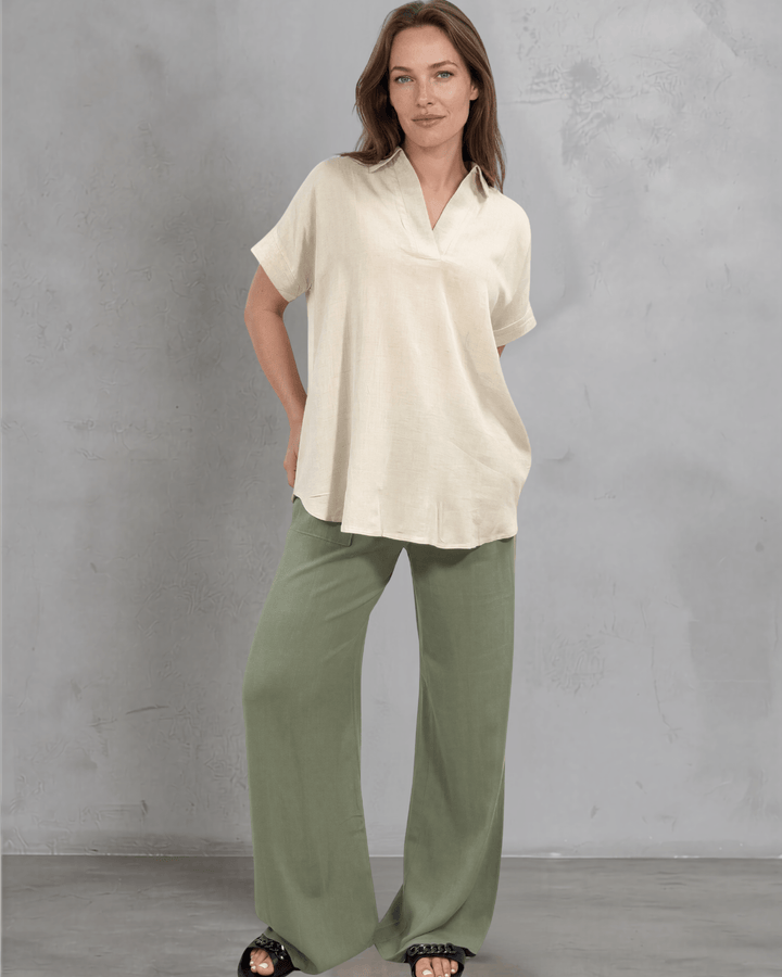 Effortlessly chic linen blend collared top in Natural. Relaxed oversized fit, V-neck, short sleeves. Made in USA. Perfect for summer &amp; resort wear.