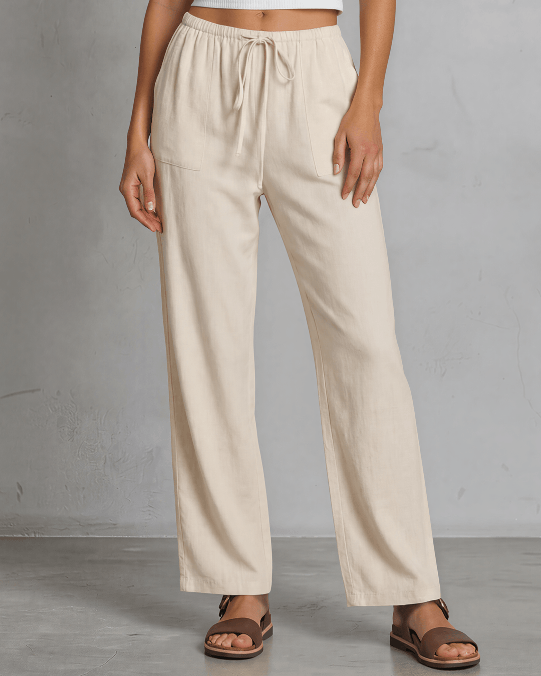 Annie wide leg pants in natural — adjustable drawstring waist, side pockets, rayon-linen blend. Relaxed fit, Made in USA. Perfect for resort & vacation wear.