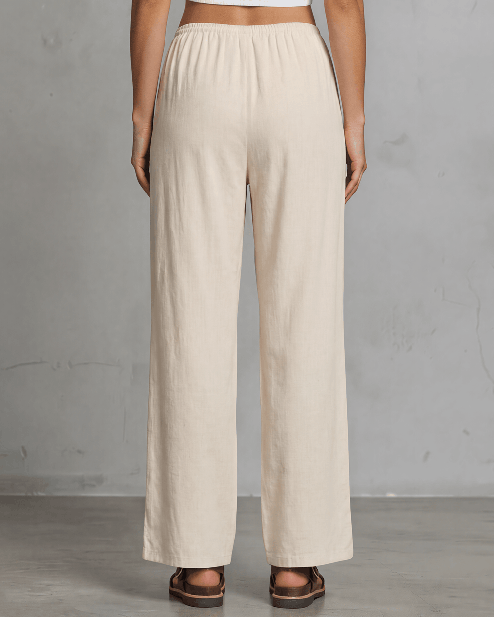 Annie wide leg pants in natural — adjustable drawstring waist, side pockets, rayon-linen blend. Relaxed fit, Made in USA. Perfect for resort & vacation wear.