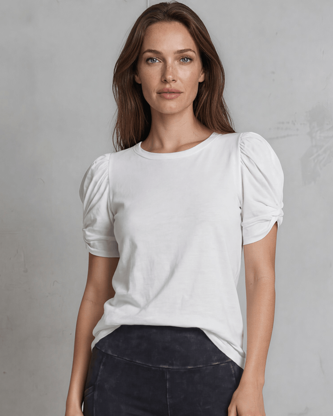 Milly Cotton Puff Sleeve Top with ruched knot detail. Soft cotton-spandex, crew neck, relaxed fit. Elevated everyday style. Made in USA.