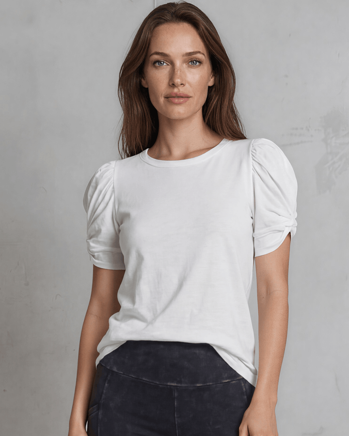 Milly Cotton Puff Sleeve Top with ruched knot detail. Soft cotton-spandex, crew neck, relaxed fit. Elevated everyday style. Made in USA.