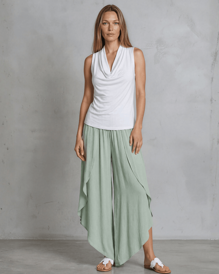 Nikki Cowl Neck Jersey Top in White. Soft rayon-spandex, draped cowl neck, semi-fitted, sleeveless. Polished &amp; versatile. Made in USA. Sizes S–L.