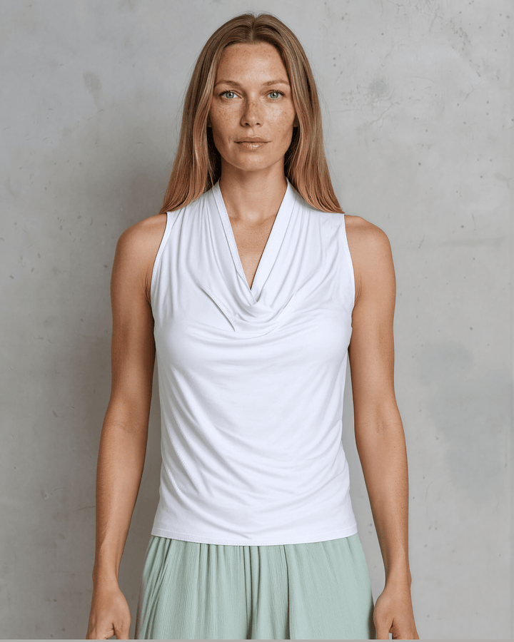 Nikki Cowl Neck Jersey Top in White. Soft rayon-spandex, draped cowl neck, semi-fitted, sleeveless. Polished &amp; versatile. Made in USA. Sizes S–L.