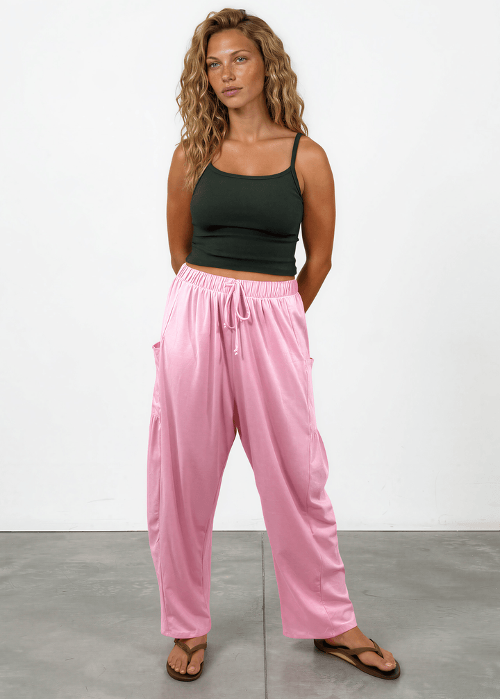 Shop the Bailey Baggy Drawstring Pants in Pink. Relaxed fit, deep pockets, soft cotton-spandex blend. Perfect for lounging and weekends. Made in USA.
