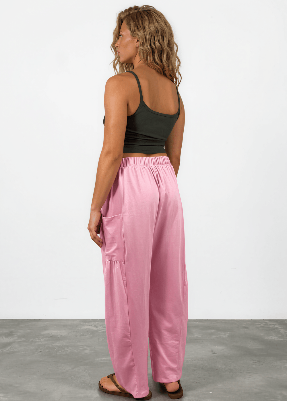 Shop the Bailey Baggy Drawstring Pants in Pink. Relaxed fit, deep pockets, soft cotton-spandex blend. Perfect for lounging and weekends. Made in USA.