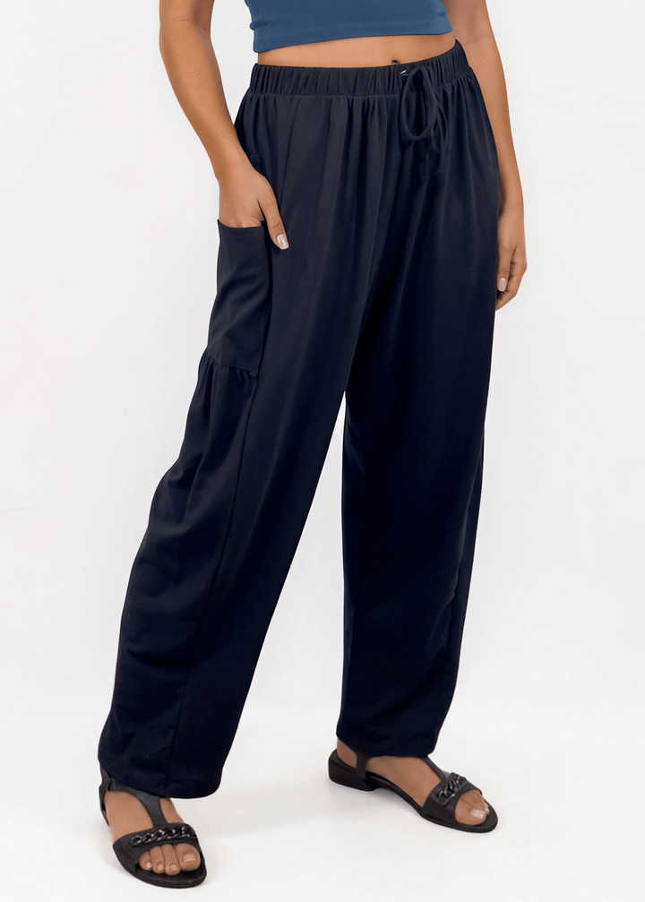 Shop the Bailey Baggy Drawstring Pants in Black. Relaxed fit, deep pockets, soft cotton-spandex blend. Perfect for lounging and weekends. Made in USA.