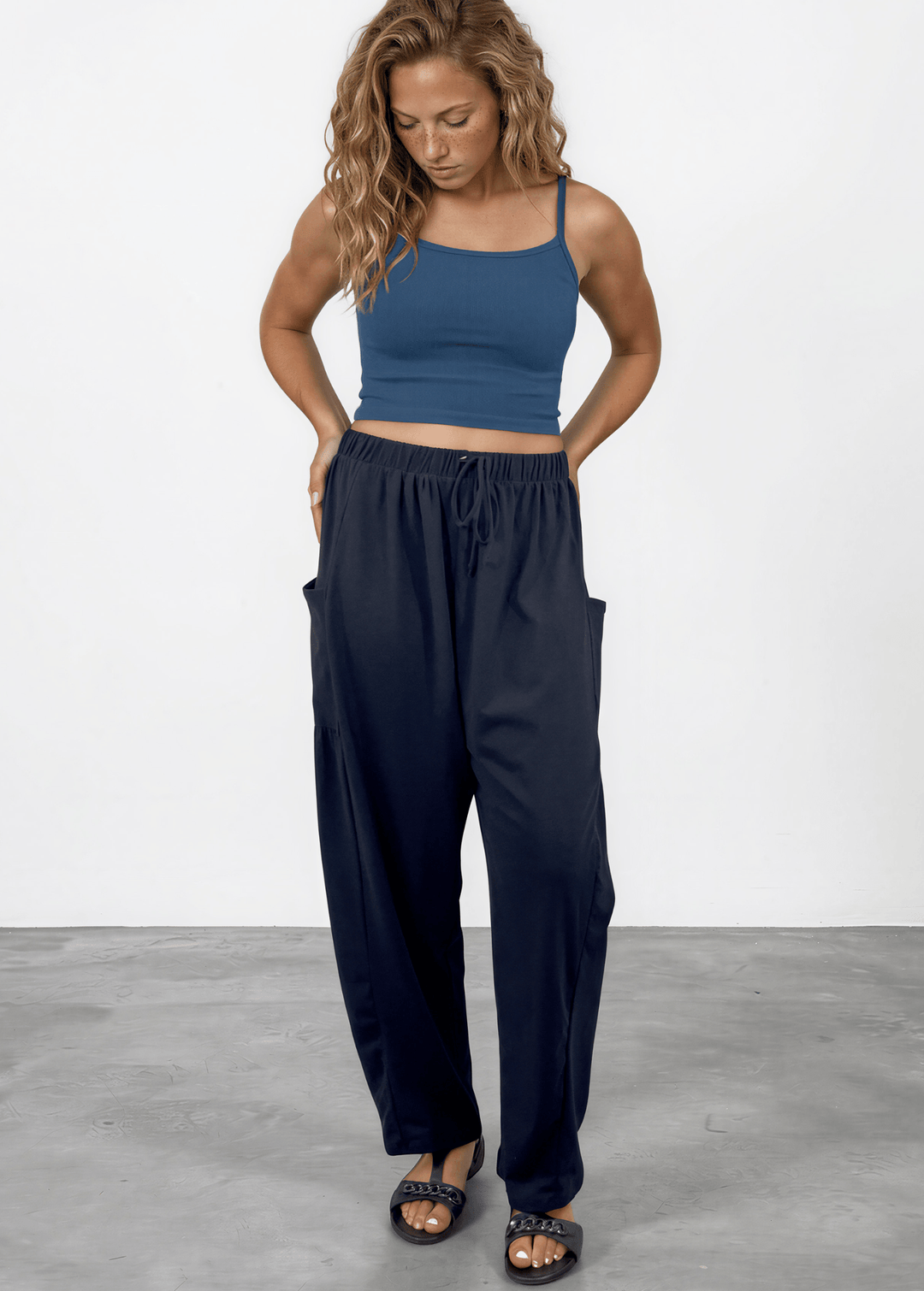 Shop the Bailey Baggy Drawstring Pants in Black. Relaxed fit, deep pockets, soft cotton-spandex blend. Perfect for lounging and weekends. Made in USA.