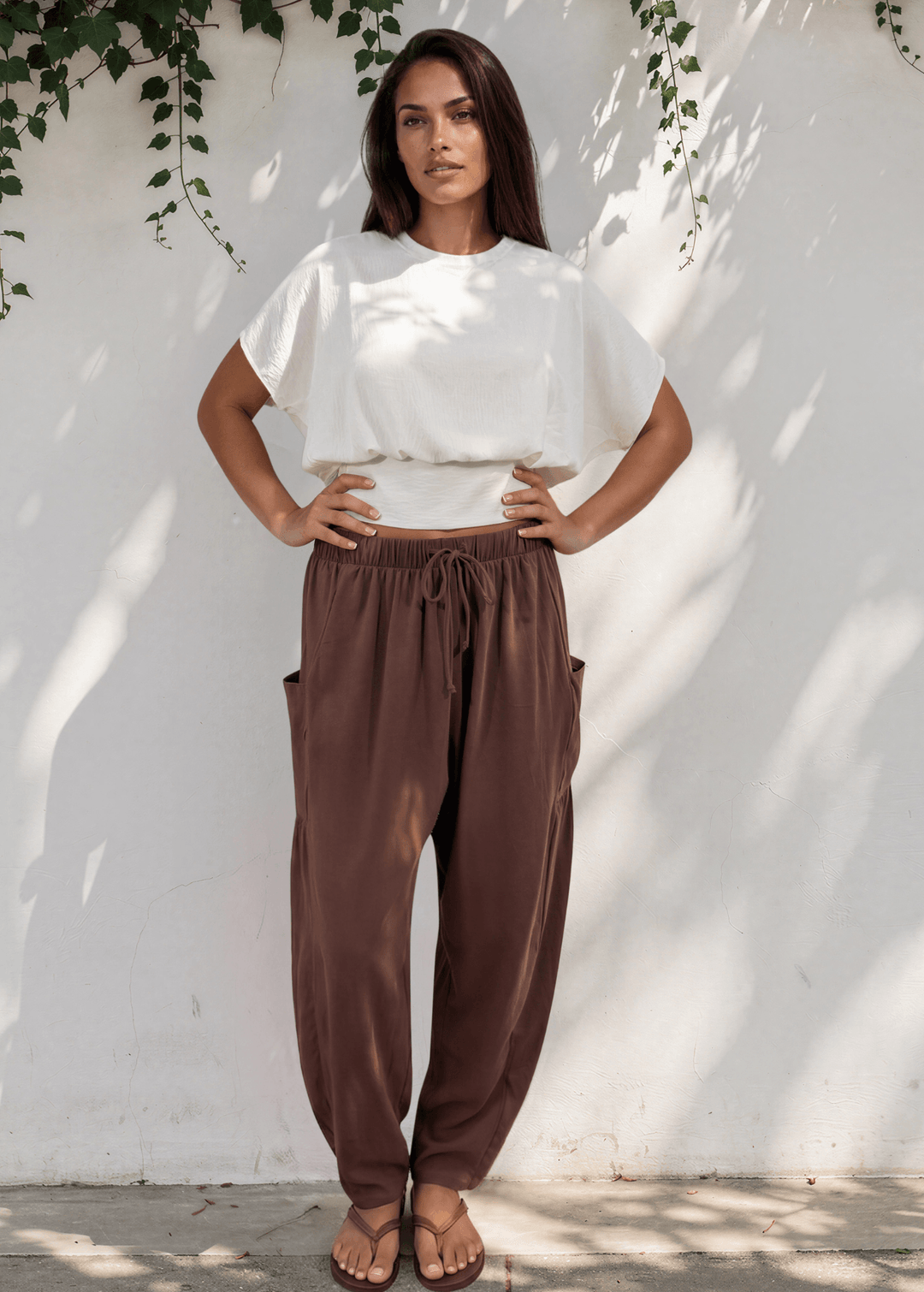 Bailey Baggy Drawstring Pants in Brown. Relaxed fit, deep pockets, soft cotton-spandex blend. Perfect for lounging and weekends. Made in USA.