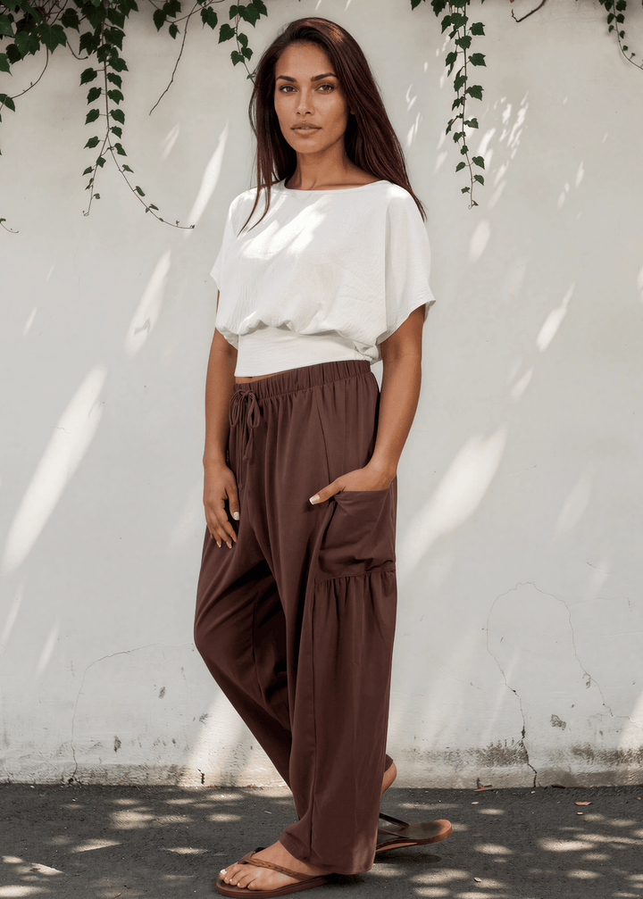 Bailey Baggy Drawstring Pants in Brown. Relaxed fit, deep pockets, soft cotton-spandex blend. Perfect for lounging and weekends. Made in USA.