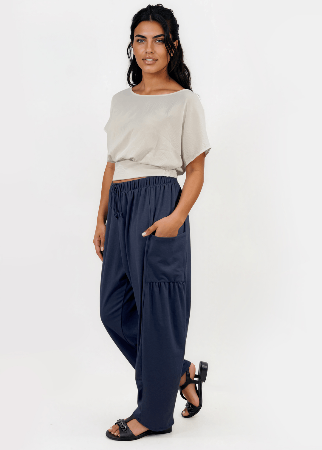 Shop the Bailey Baggy Drawstring Pants in Navy. Relaxed fit, deep pockets, soft cotton-spandex blend. Perfect for lounging and weekends. Made in USA.