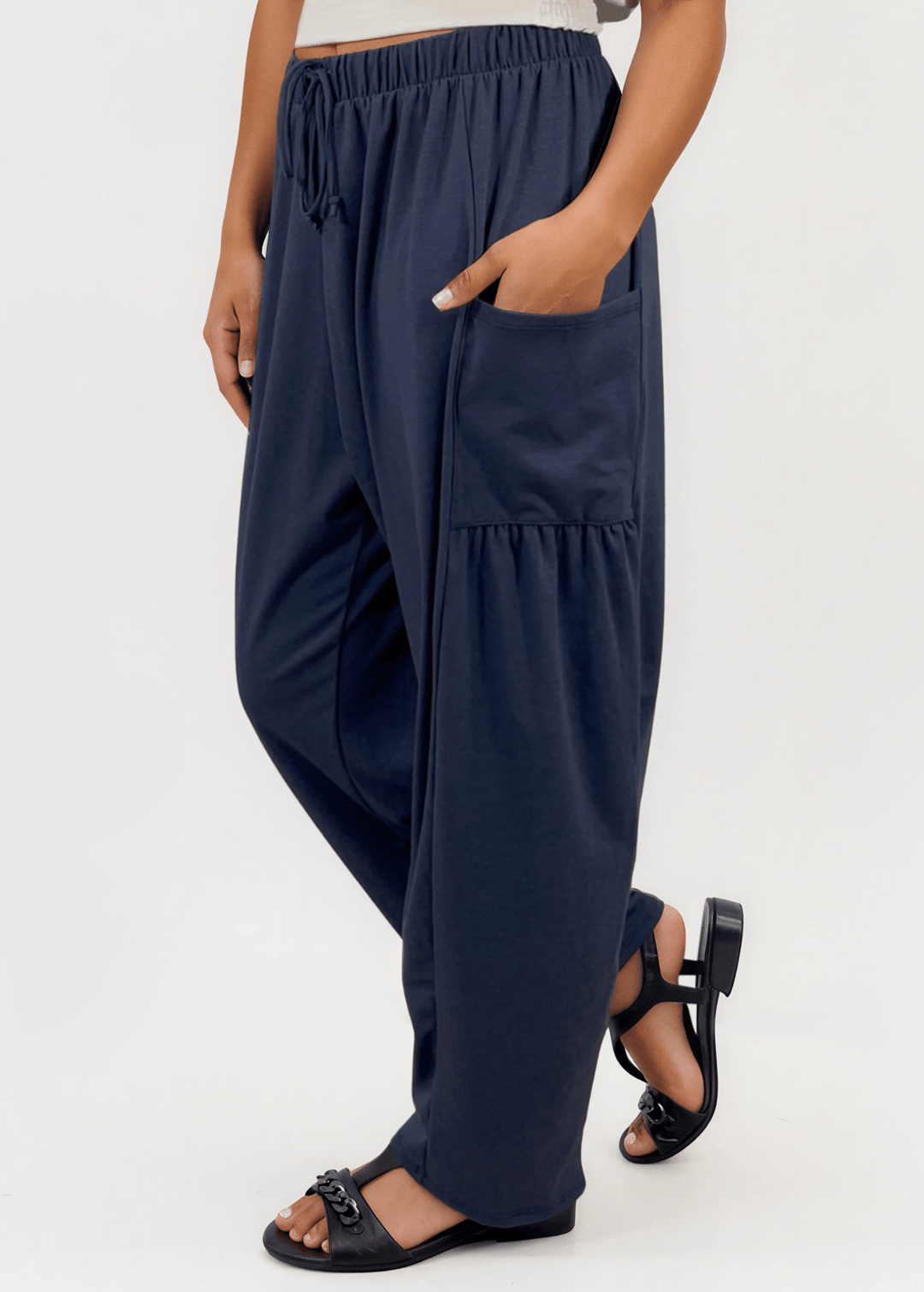 Shop the Bailey Baggy Drawstring Pants in Navy. Relaxed fit, deep pockets, soft cotton-spandex blend. Perfect for lounging and weekends. Made in USA.
