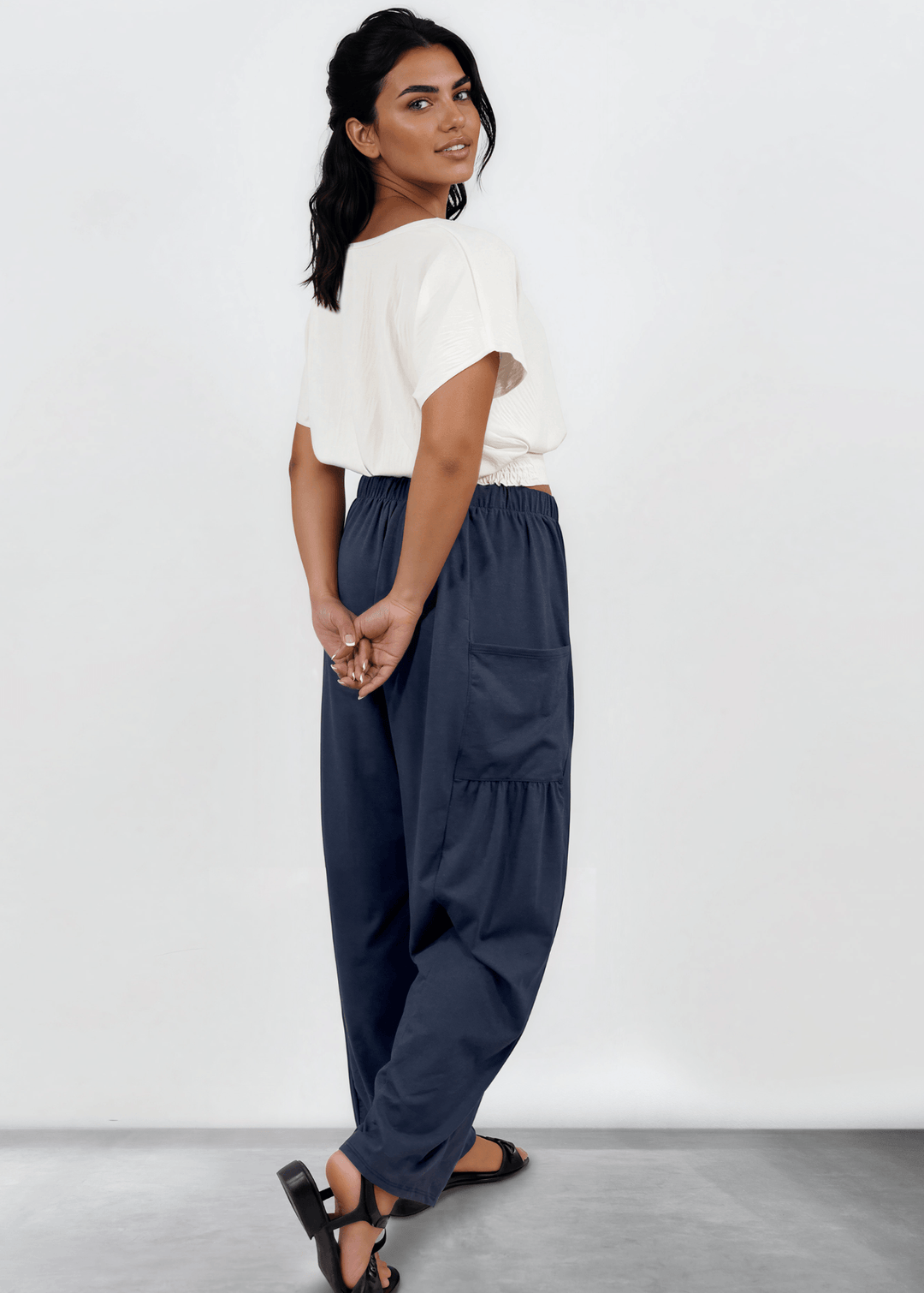 Shop the Bailey Baggy Drawstring Pants in Navy. Relaxed fit, deep pockets, soft cotton-spandex blend. Perfect for lounging and weekends. Made in USA.