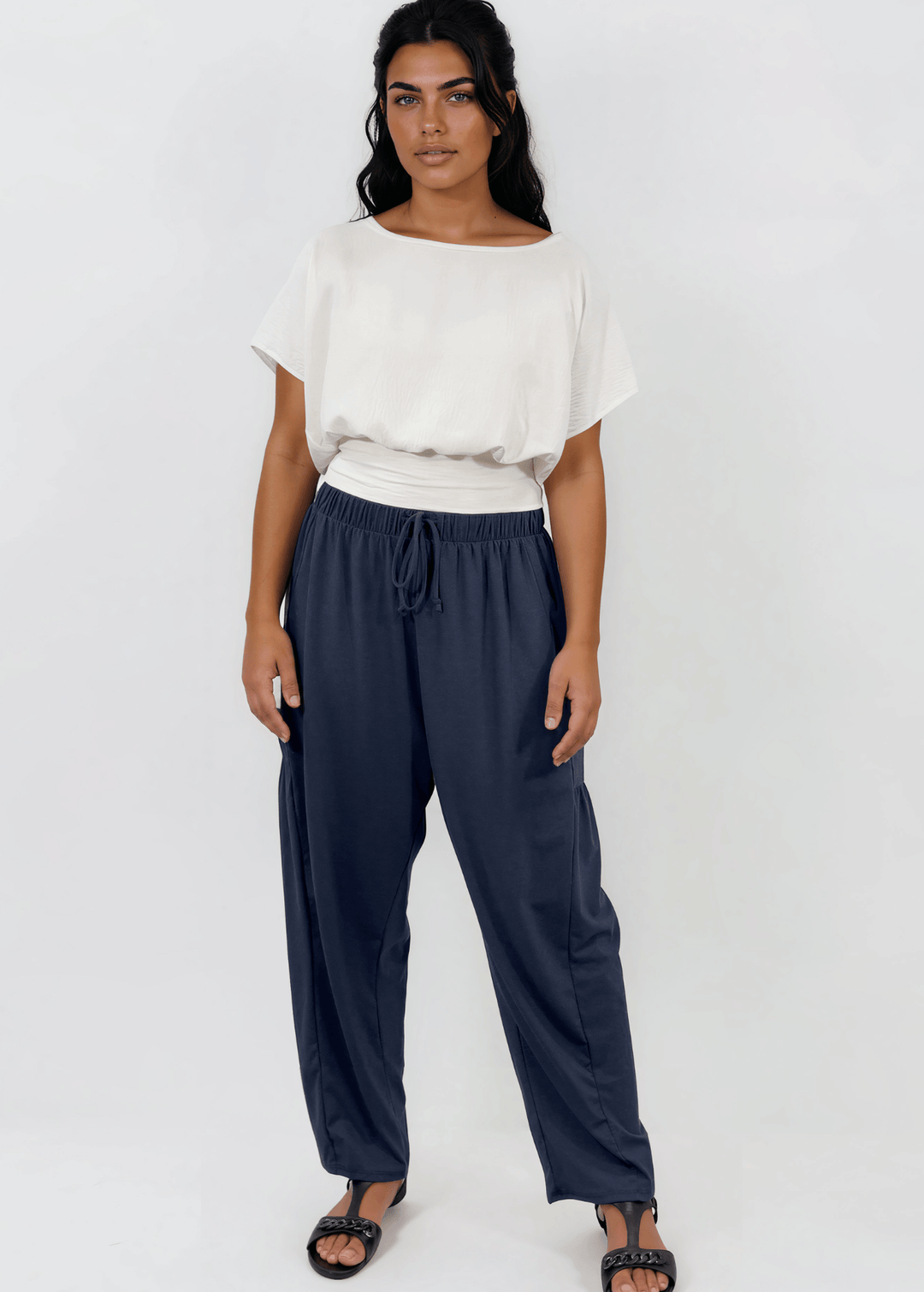 Shop the Bailey Baggy Drawstring Pants in Navy. Relaxed fit, deep pockets, soft cotton-spandex blend. Perfect for lounging and weekends. Made in USA.