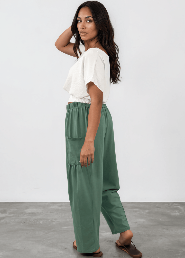 Shop the Bailey Baggy Drawstring Pants in Sage. Relaxed fit, deep pockets, soft cotton-spandex blend. Perfect for lounging and weekends. Made in USA.