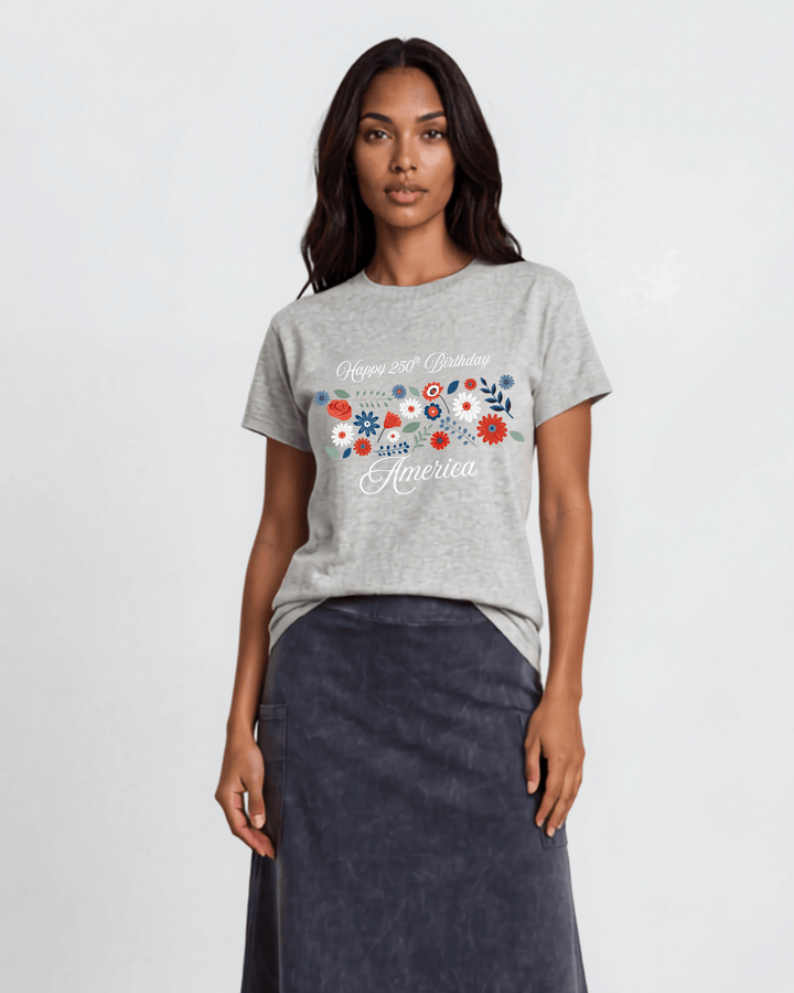 "Happy 250th Birthday America" floral graphic tee — red, white &amp; blue wildflowers on heather gray. Made in USA, 100% cotton, relaxed fit, XS–3X. Perfect for 4th of July.