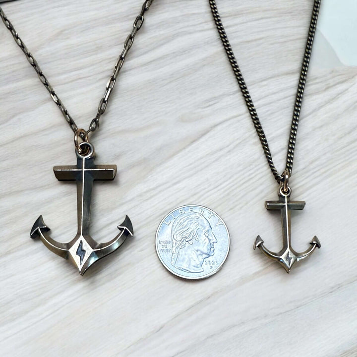 Handcrafted solid bronze anchor necklace on an antique bronze chain. Unisex. Custom lengths available. Made in USA with a lifetime warranty.