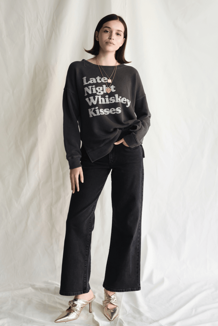 Whiskey Kisses Sweatshirt by People of Leisure — vintage-inspired graphic crewneck in Vintage Black. Ethically made in LA. Sizes XS–XL.