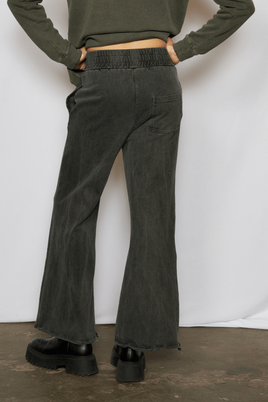 The Lainey Pant by People of Leisure — 100% organic cotton, mid-rise flare in Vintage Black &amp; Chocolate Brown. Made in LA. Sizes XS–XL.
