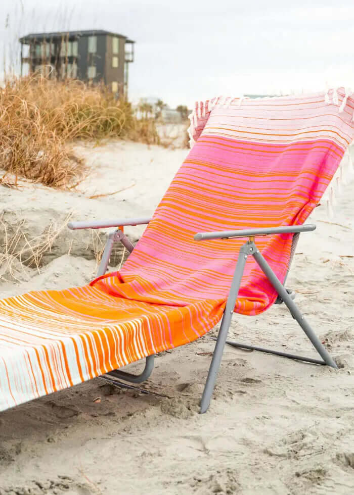 Shop the Beachables Striped 3-in-1 Turkish Cotton Beach Bag – converts from bag to towel to chair cover. Sand-resistant, quick-dry, machine washable. Made in USA.